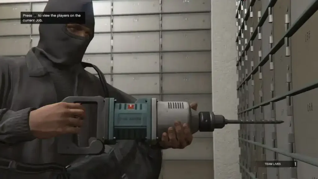A player drills a safe deposit box during the Fleeca Job, the first of many of the best GTA 5 Online heists.