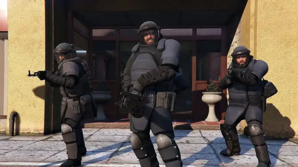 Paleto Bay Heist: Trevor, wearing heavy armor, unleashes a Minigun on police forces during the chaotic Paleto Bay Heist.
